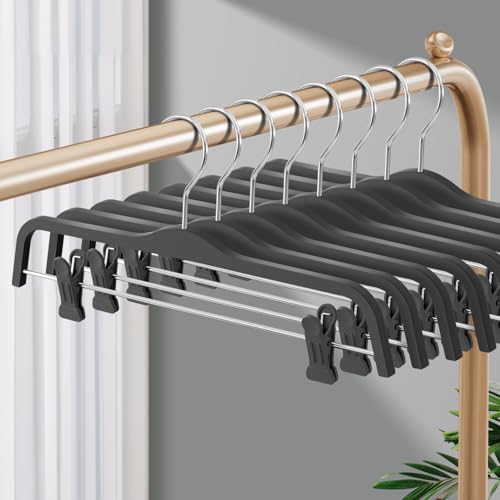 Set of 10 HUADYMEET 14-inch grey skirt hangers with adjustable clips for organized clothing storage.