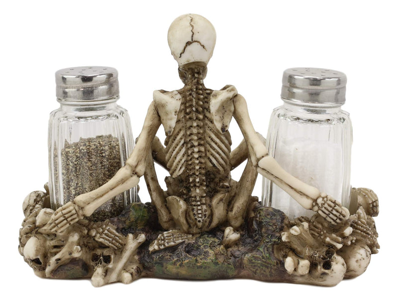 [Australia - AusPower] - Ebros Gothic Day Of The Dead Graveyard Garnish Meditating Skeleton Seated On Graveyard Of Bones And Skulls Salt & Pepper Shakers Holder Figurine Set 6.5" Wide Fantasy Kitchen Decor Statue 