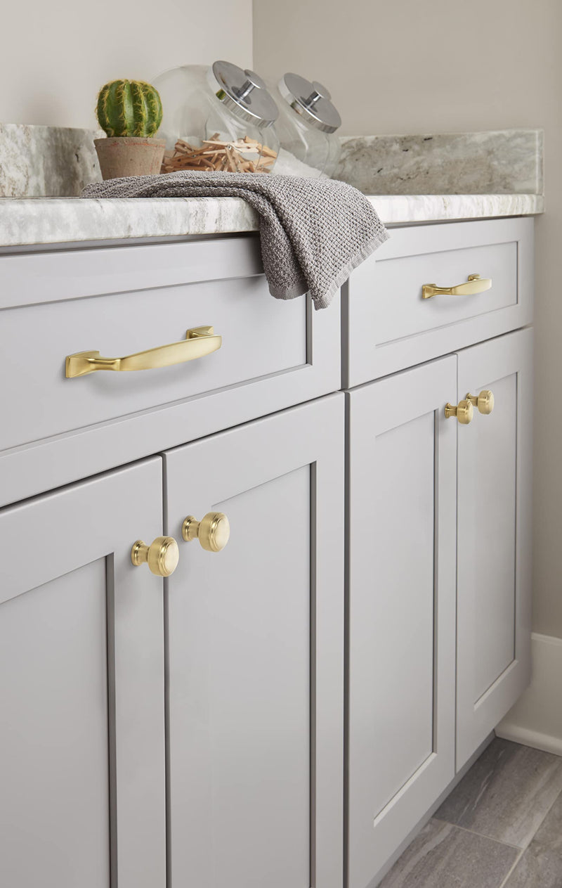 Amerock Highland Ridge Champagne Bronze push-pull cabinet knob, 1-3/16 inch diameter, decorative drawer and cabinet hardware.