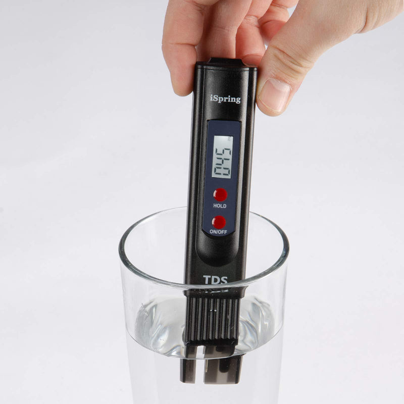 iSpring TDS2 digital TDS meter with backlit LCD display in black, used for measuring water purity and temperature.
