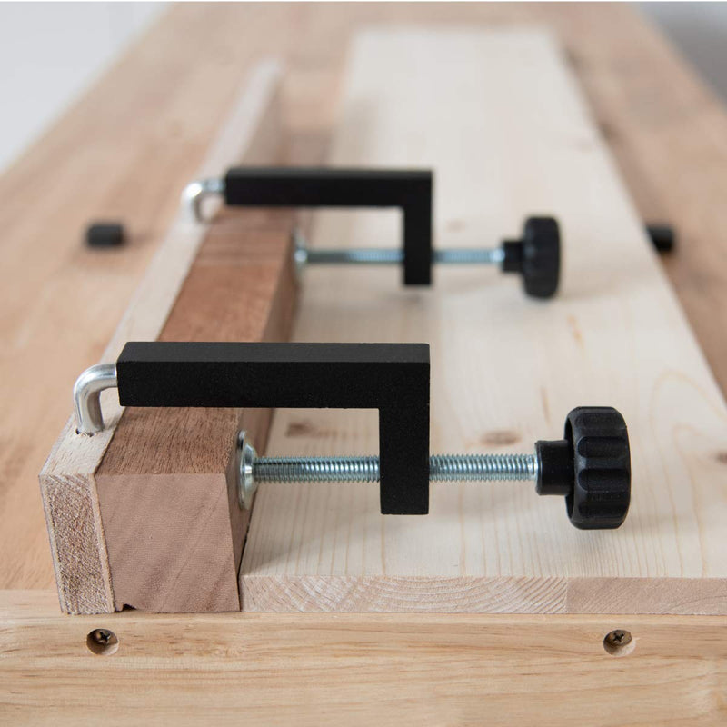 Two POWERTEC 71004 universal fence C-clamps for woodworking and workshop use, showing their sturdy metal construction.
