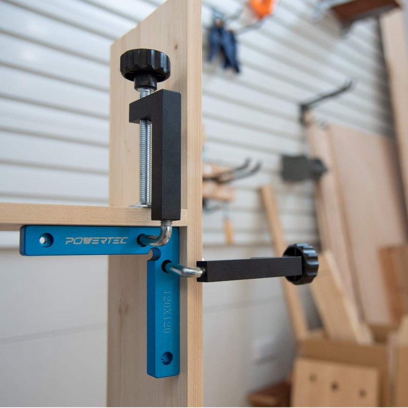 Set of two POWERTEC universal fence clamps, C-Clamps for woodworking and shop projects, shown gripping a wooden workpiece.