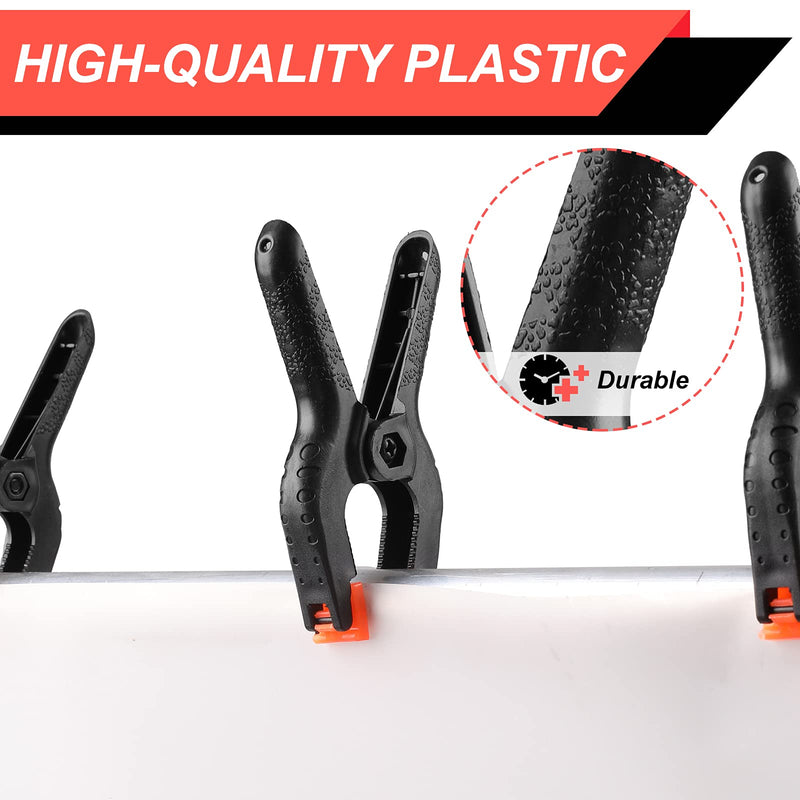 Eight black Romeda 4.5-inch spring clamps with plastic handles, ideal for crafts, photography, woodworking, and backdrop stands.