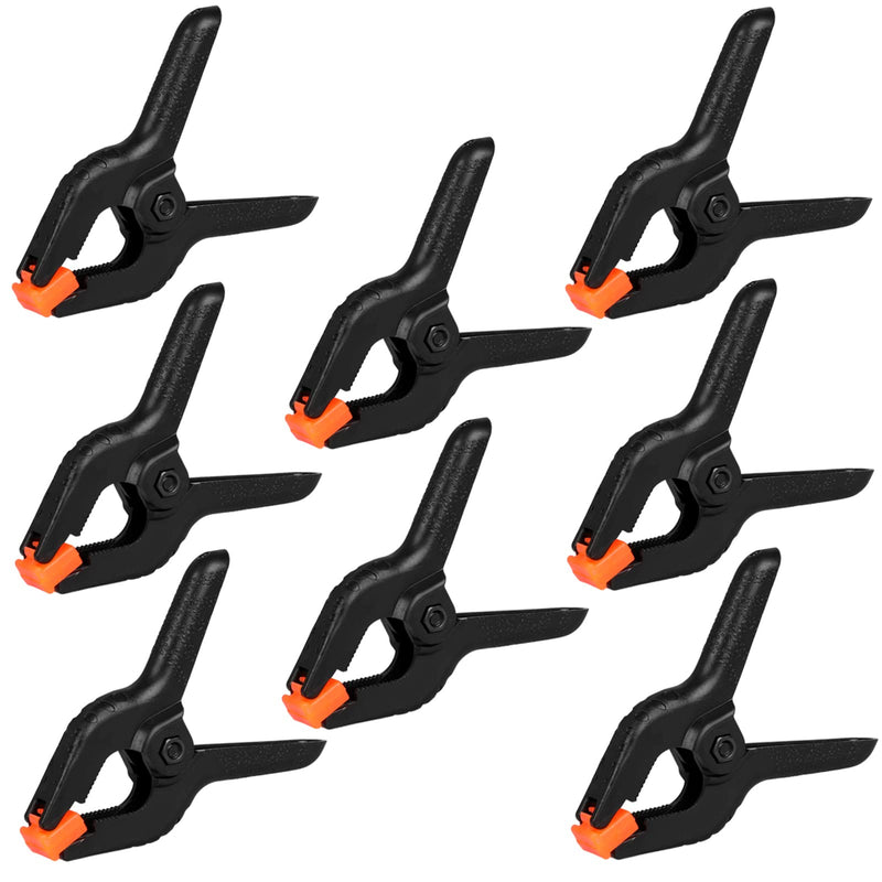 Eight black Romeda 4.5-inch spring clamps, plastic clips for crafts, backdrop stands, woodworking, and photography studio use.